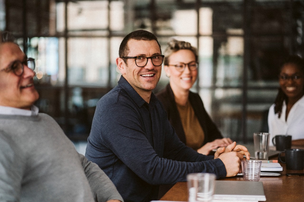 A group of people having a business meeting